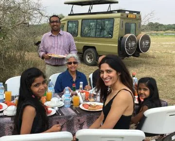 Native Africa Tours guests at an outdoor safari meal