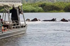 Tourists on a Boat Trip on the Nile River in Murchison Falls