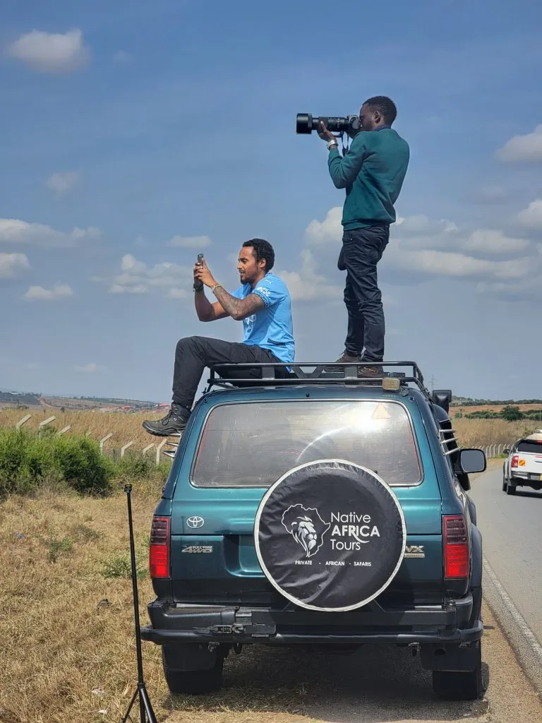 capturing pictures of Zebras on the road to Bwindi from Entebbe