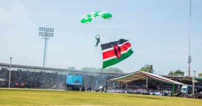 Kenyans celebrating Madaraka Day with flags and parades