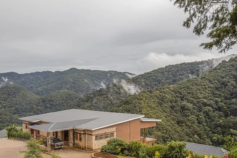 Safari lodge near Bwindi gorilla trekking starting point surrounded by forest, booked with Native Africa Tours.