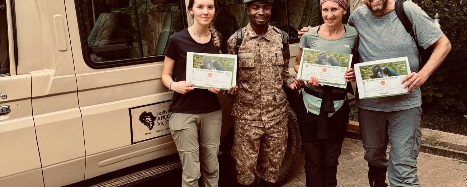 Native Africa Tours Guests showing off their Gorilla Trekking Certificate after their 1 hour with the Gorillas in the last summer