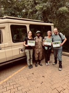Native Africa Tours Guests showing off their Gorilla Trekking Certificate after their 1 hour with the Gorillas in the last summer