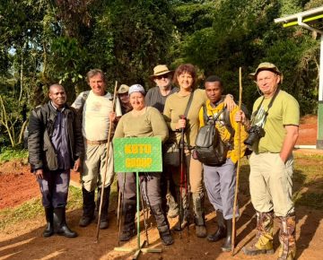 Our Guests on a Group photography safari pausing for a photo before there gorilla trekking expedition in Bwindi