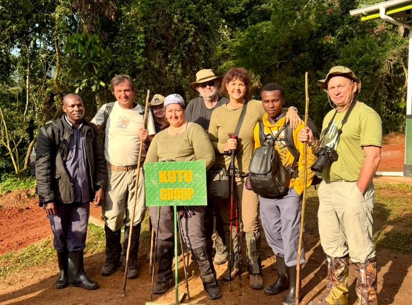 Our Guests on a Group photography safari pausing for a photo before there gorilla trekking expedition in Bwindi
