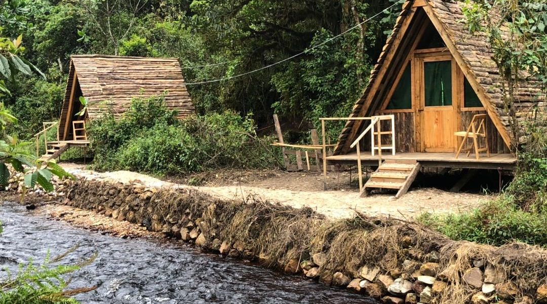 Cyinzobe Trail in Nyungwe National Park riverside cabins and rainforest scenery