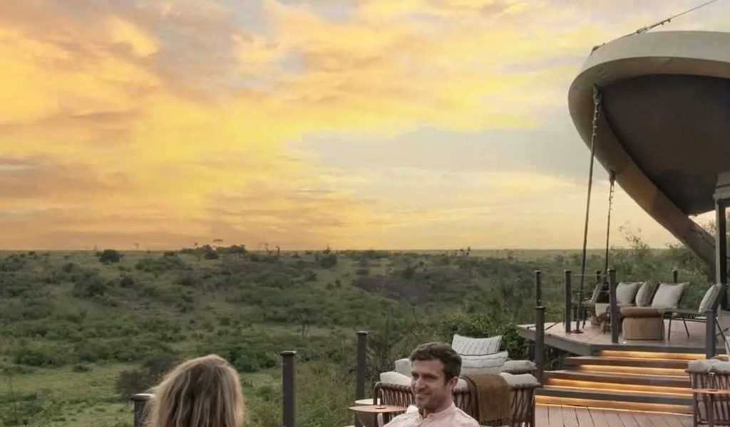 Guests on a honeymoon safari in Volcanoes National Park with gorilla trekking, luxury lodges, stunning scenery, and romance
