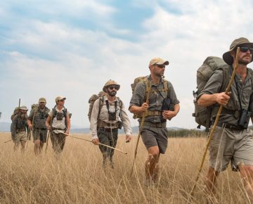 Native Africa Tours Guests on a Walking Tour in the plains of Akagera park in Rwanda.