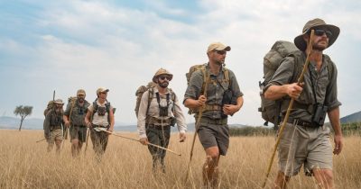 Native Africa Tours Guests on a Walking Tour in the plains of Akagera park in Rwanda.