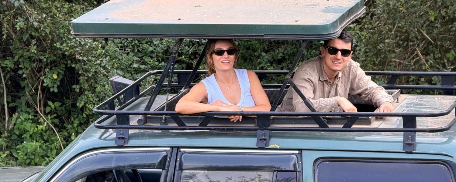 A couple in our Open roof jeep in Lake Mburo National Park while on Day 4 of their Uganda Trip that started from Kigali Rwanda